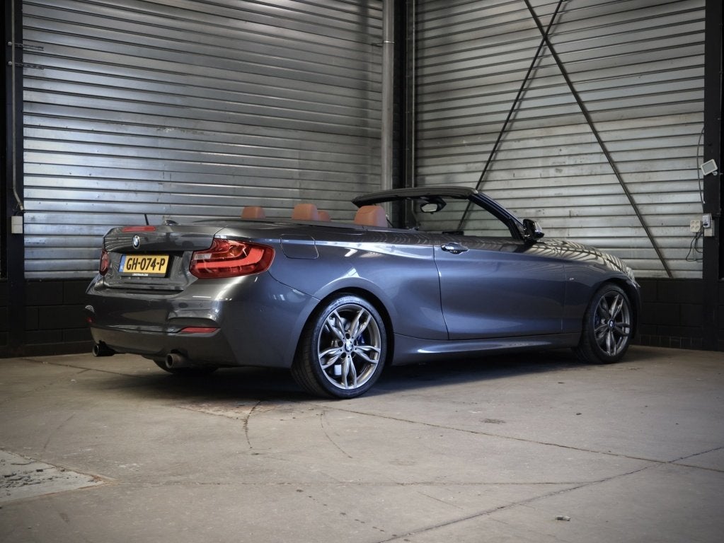 BMW 2 Serie Cabrio M235i Cabrio High Executive | Leder | H&K, Auto's, BMW, Gebruikt, Euro 6, 1595 kg, Cabriolet