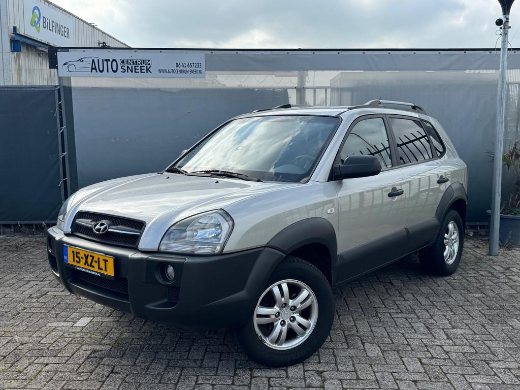Hyundai Tucson 2.0i Dynamic - NWE APK - Airco - Cruise, Auto's, Hyundai, Stof, Gebruikt, Zwart, 4 cilinders