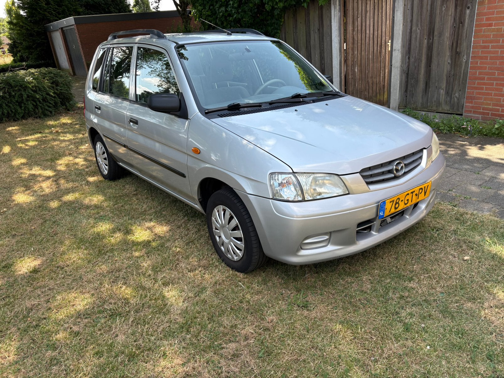 Mazda Demio 1.5 Exclusive 2001 Grijs, Auto's, Mazda, Particulier, Demio, Benzine, D, MPV, Handgeschakeld, Origineel Nederlands