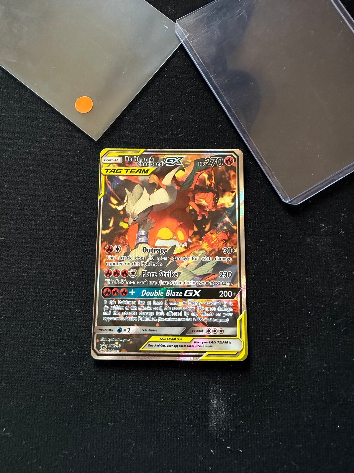 Reshiram & Charizard GX Tag Team Pokémon promo Kaart, Ophalen of Verzenden, Zo goed als nieuw, Losse kaart, Foil