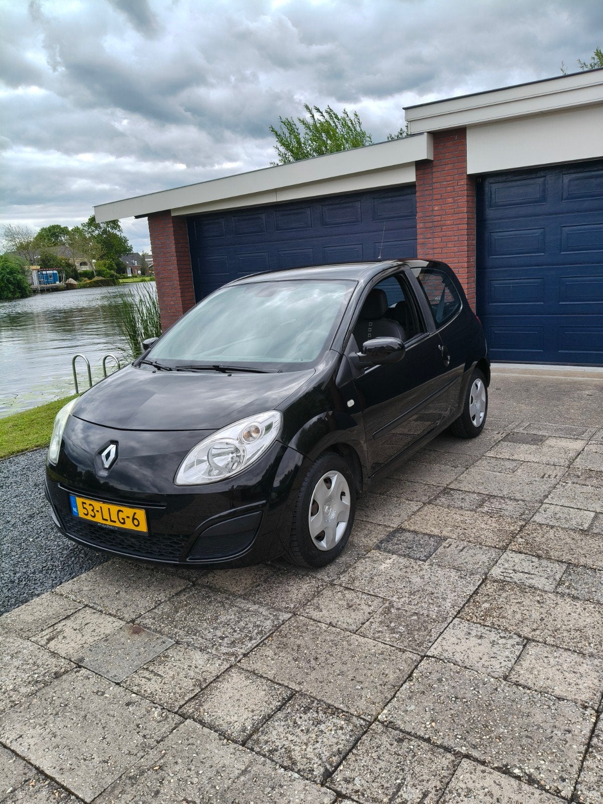 Renault Twingo 1.2 16V 2010 Zwart airco, Auto's, Renault, 839 kg, Twingo, 4 cilinders, 4 stoelen