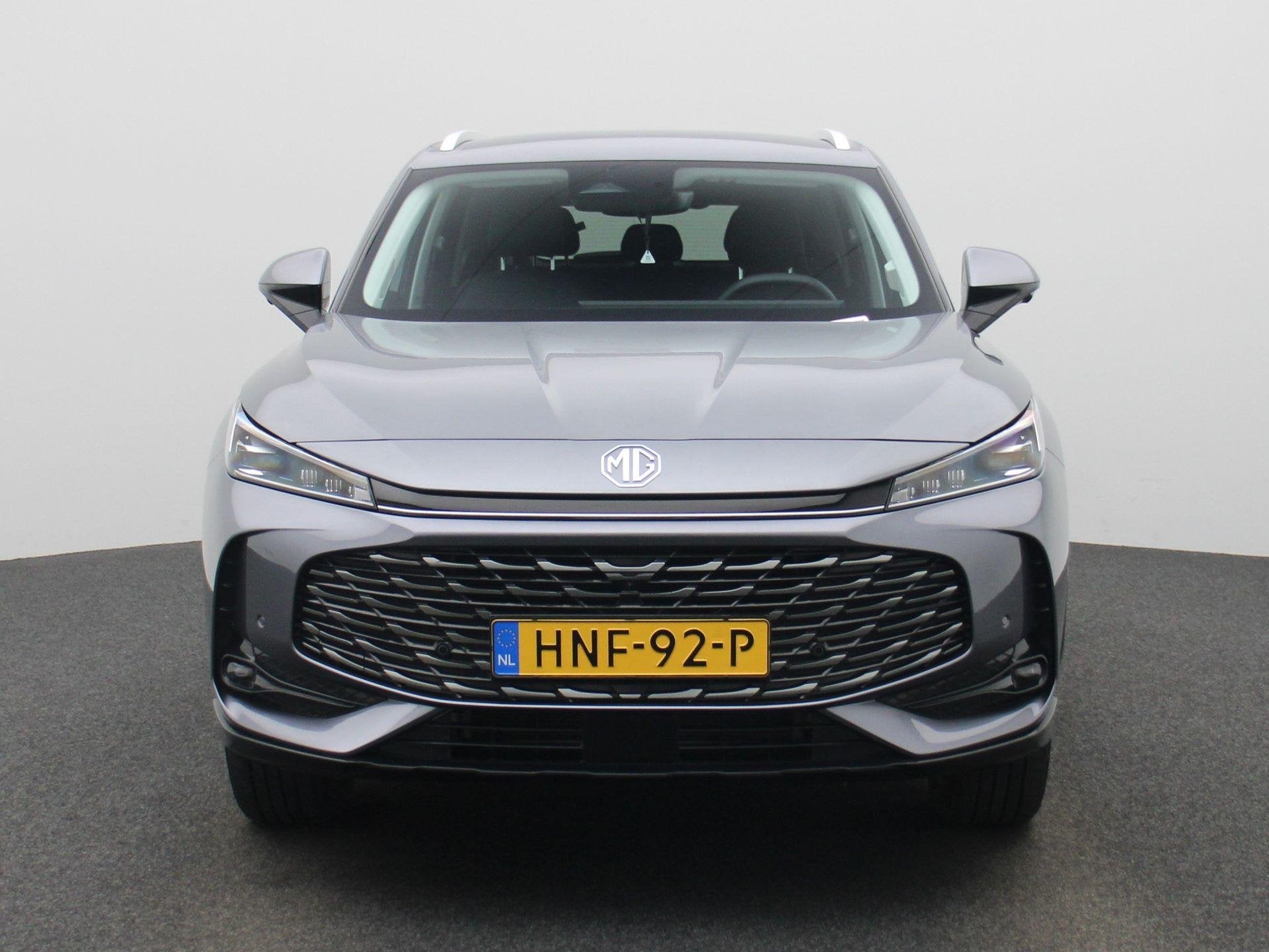 MG HS PHEV 1.5 272pk Aut. Luxury | 100km Electrisch | Navi |, Auto's, 12 maanden, Stof, Gebruikt, 4 cilinders