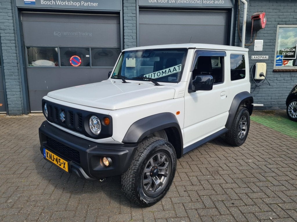 Suzuki Jimny 1.5 Style Allgrip AUTOMAAT 4X4 Carplay Trekhaak, Auto's, Suzuki, Automaat, 0 cilinders, Gebruikt, Wit