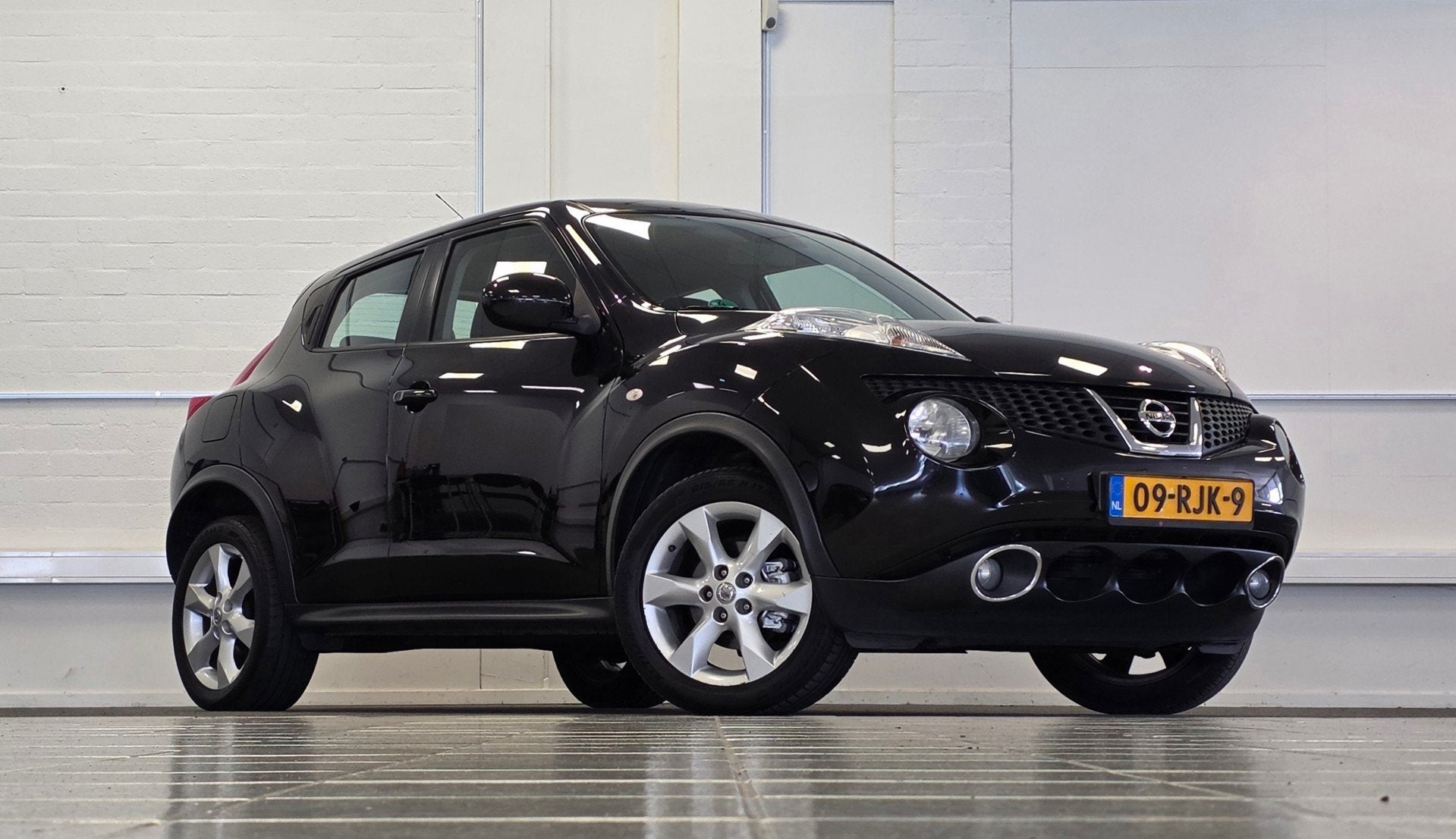 Nissan Juke 1.6i 16V Acenta Navigatie Garantie APK Nieuw, Auto's, Voorwielaandrijving, Euro 5, Stof, Zwart