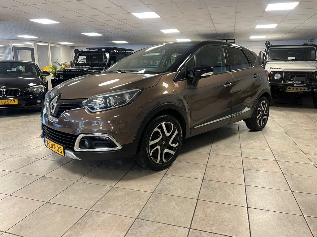 Renault Captur 1.2 TCe Helly Hansen Automaat, Lederen bekled, Euro 5, Zwart, 4 cilinders, Bruin