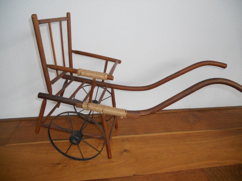 oude houten poppenwagen, Ophalen