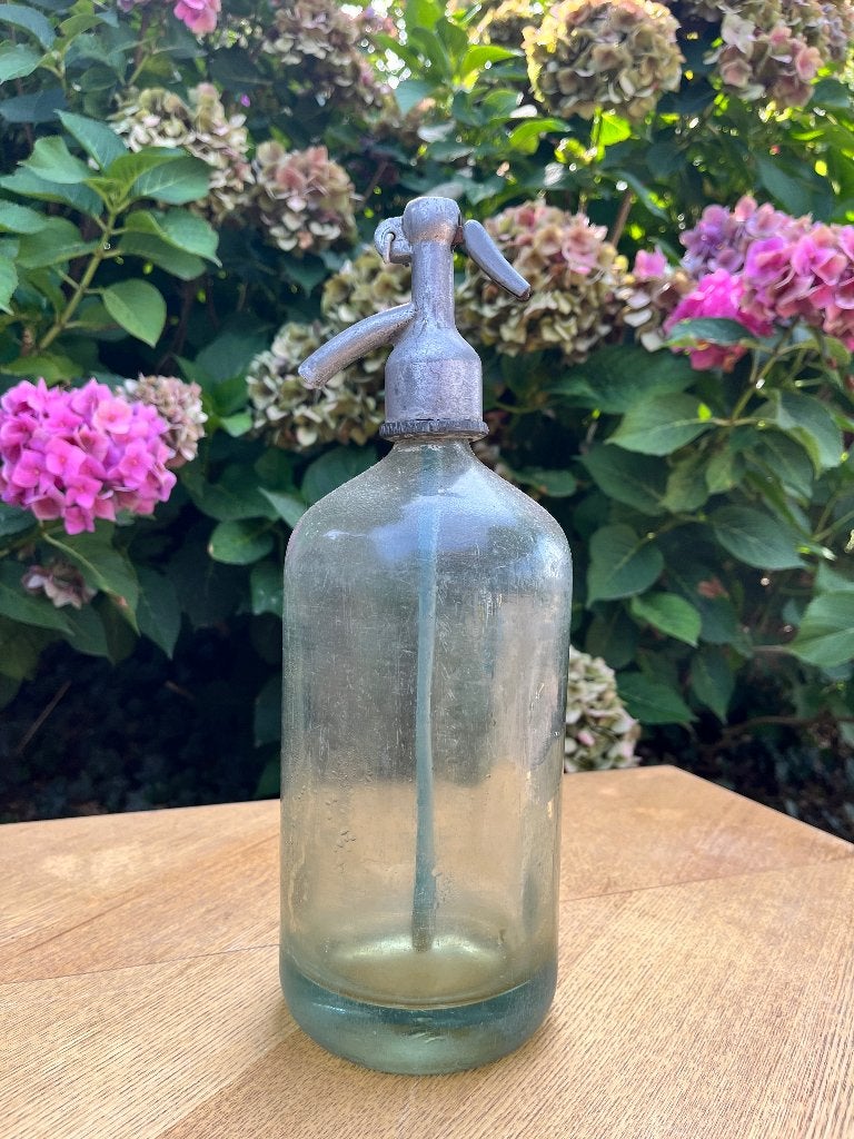 Brocante spuitfles, Ophalen