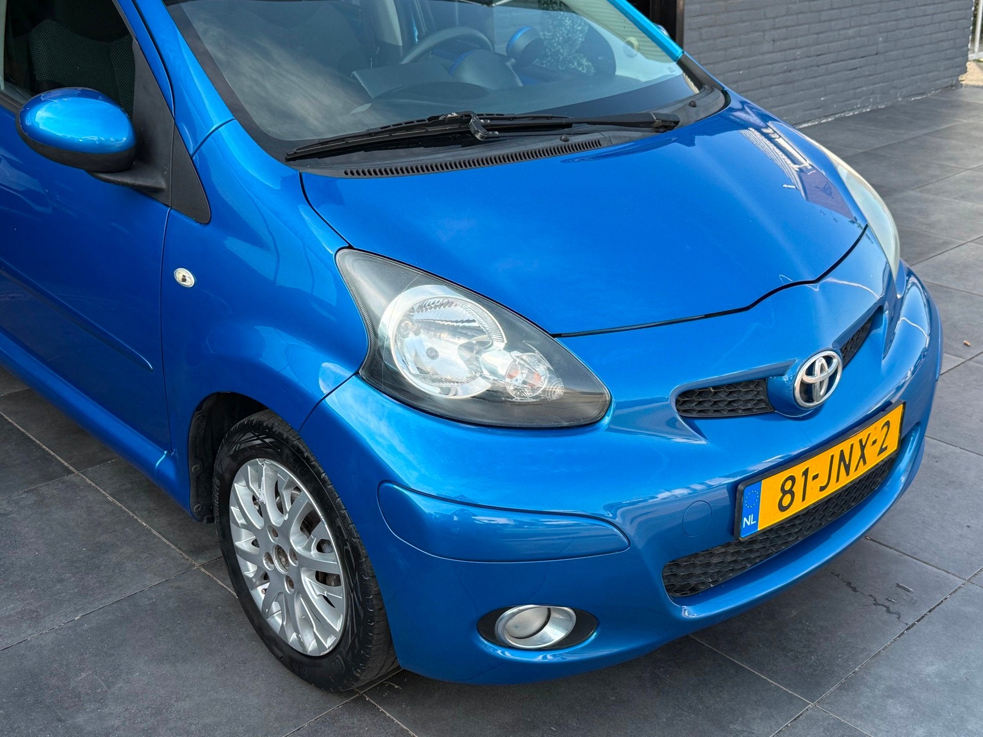 Toyota Aygo 1.0-12V|Airco|Carplay|Cruise|PDC|1e Eig|NAP|APK, Auto's, Toyota, Voorwielaandrijving, Stof, Gebruikt, Huisgarantie