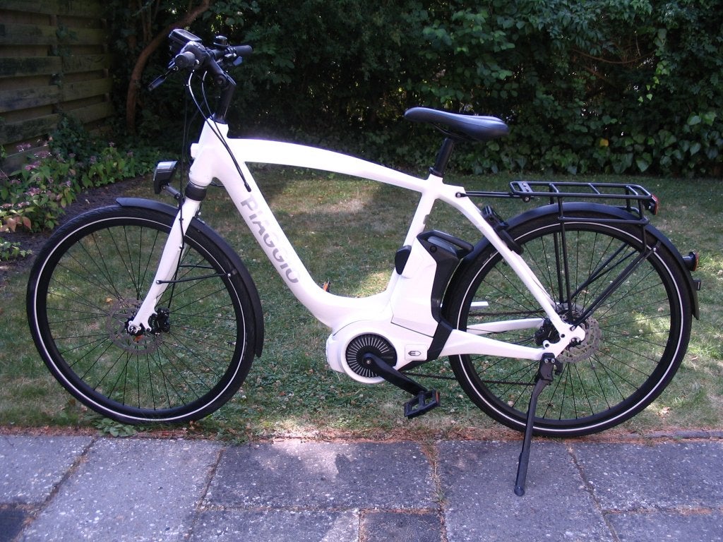 Piaggio e-bike herenfiets (54 cm) met 500 km(!), Zo goed als nieuw, 51 tot 55 cm, 50 km per accu of meer, Ophalen