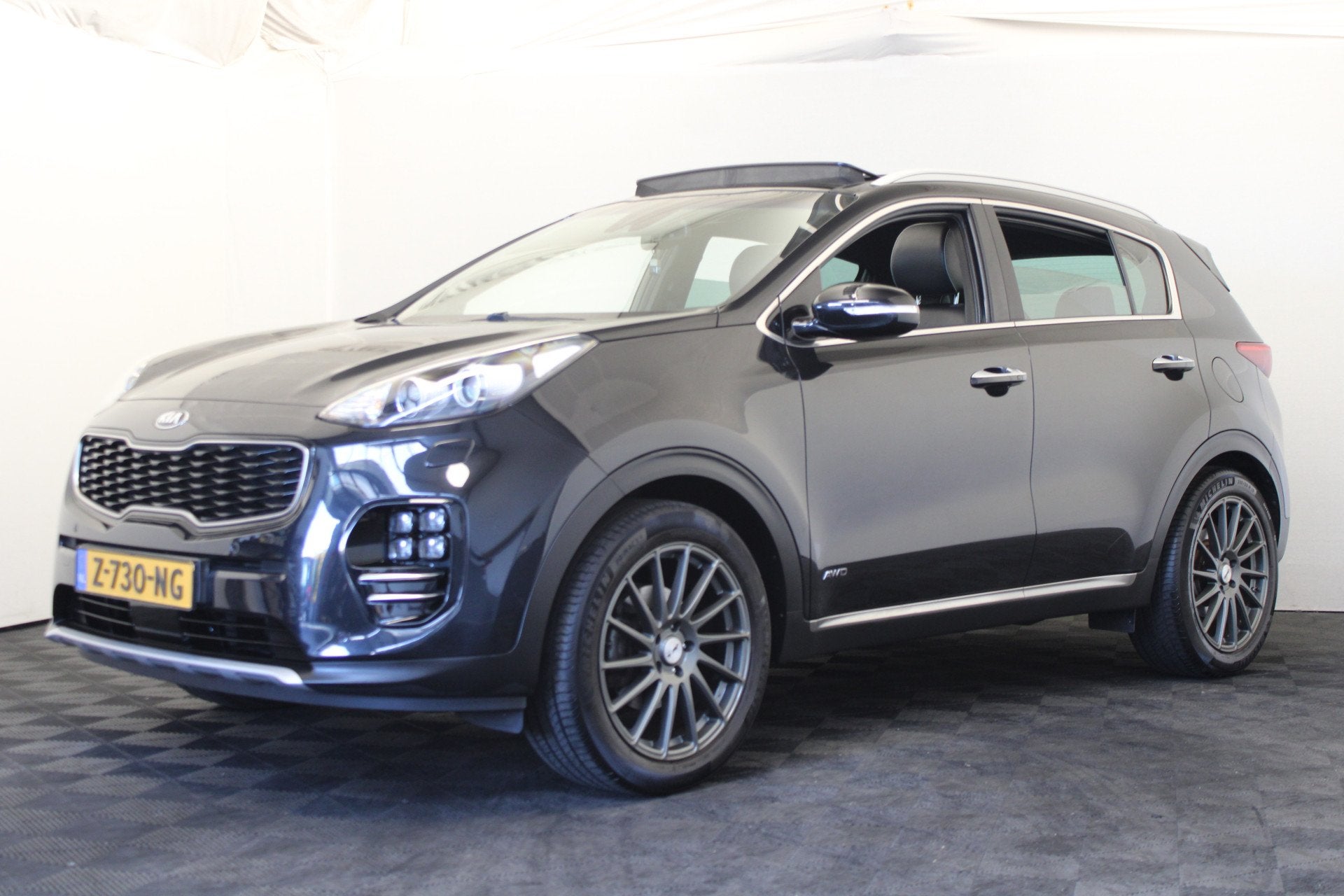 Kia Sportage 1.6 T-GDI 4WD GT-Line PlusLine (bj 2016), Auto's, Kia, Gebruikt, 4 cilinders, Zwart, Leder