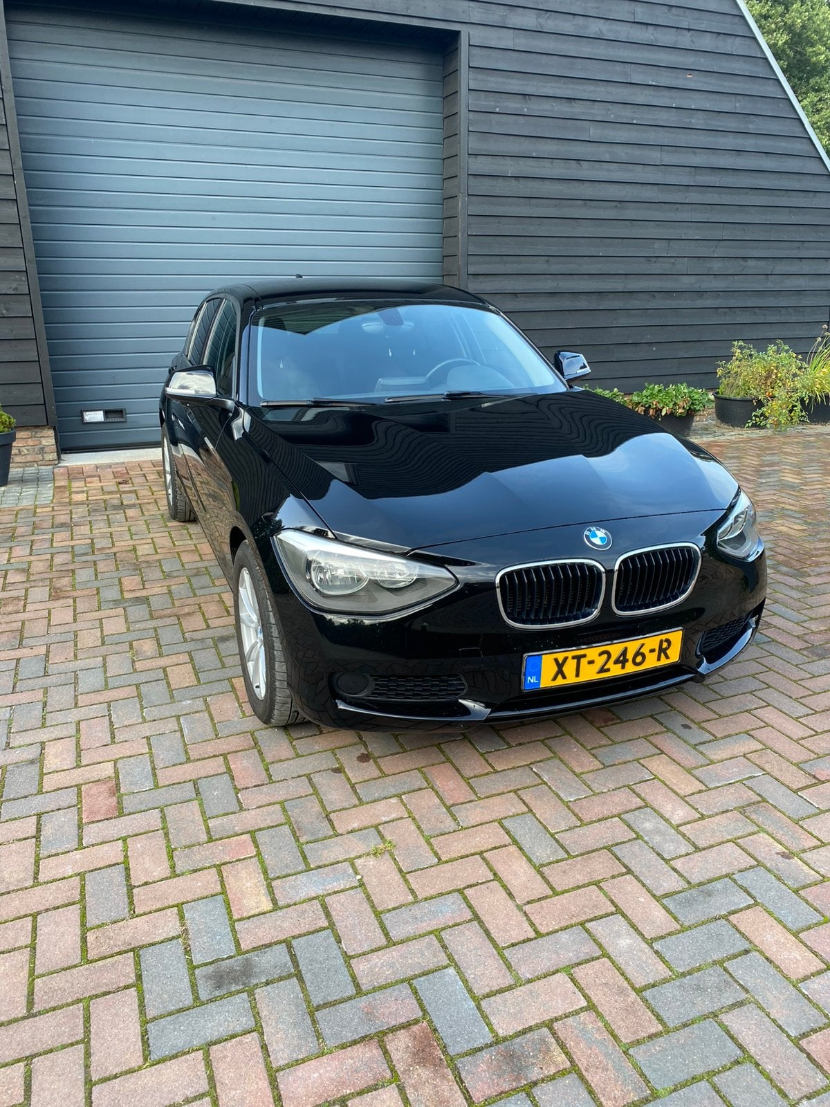 BMW 1-serie 114i 5-DR Zwart Stoelverwarming, Auto's, Zwart, 4 cilinders, Zwart, 102 pk