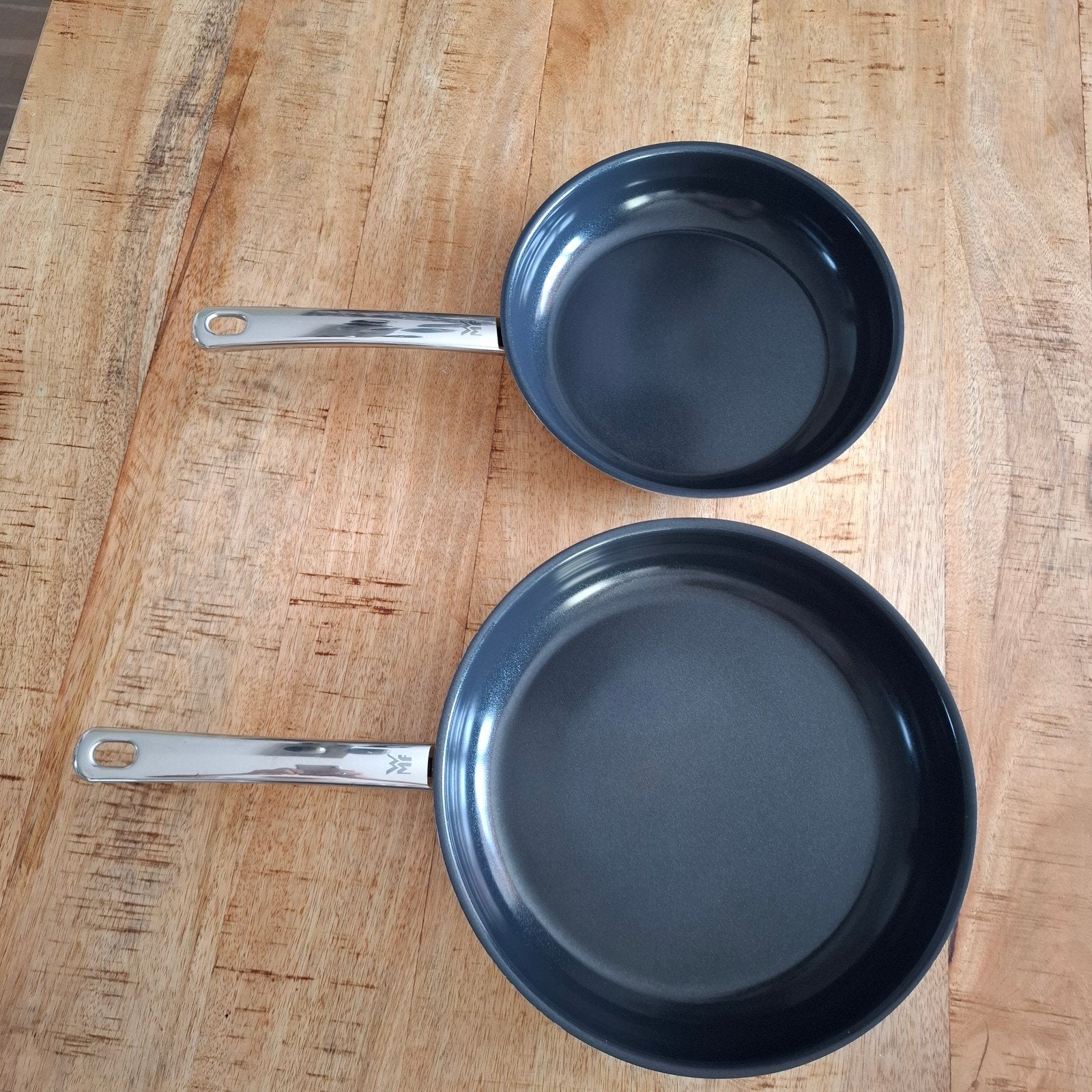 WMF pannen - Zo goed als nieuw, Huis en Inrichting, Keuken | Potten en Pannen, Ophalen of Verzenden, Zo goed als nieuw, Rvs, Pannenset