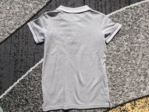 Grijze polo Maat 110-116 h3, Australian, Onbekend, Nieuw, Ophalen of Verzenden