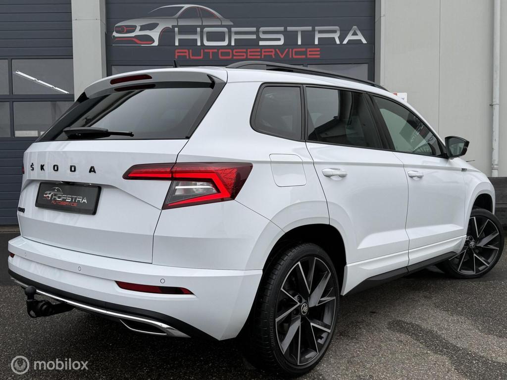 Skoda Karoq 1.5 TSI ACT Sportline Pano Canton-sound Winterpa, Auto's, Skoda, 4 cilinders, Alcantara, Wit, SUV of Terreinwagen