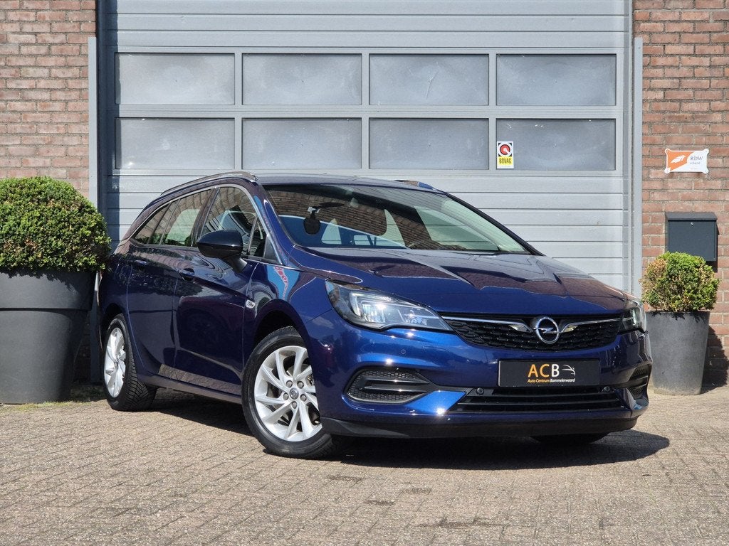 Opel Astra Sports Tourer 1.2 Business Elegance Dealer onderh, Gebruikt, Euro 6, 1199 cc, Blauw
