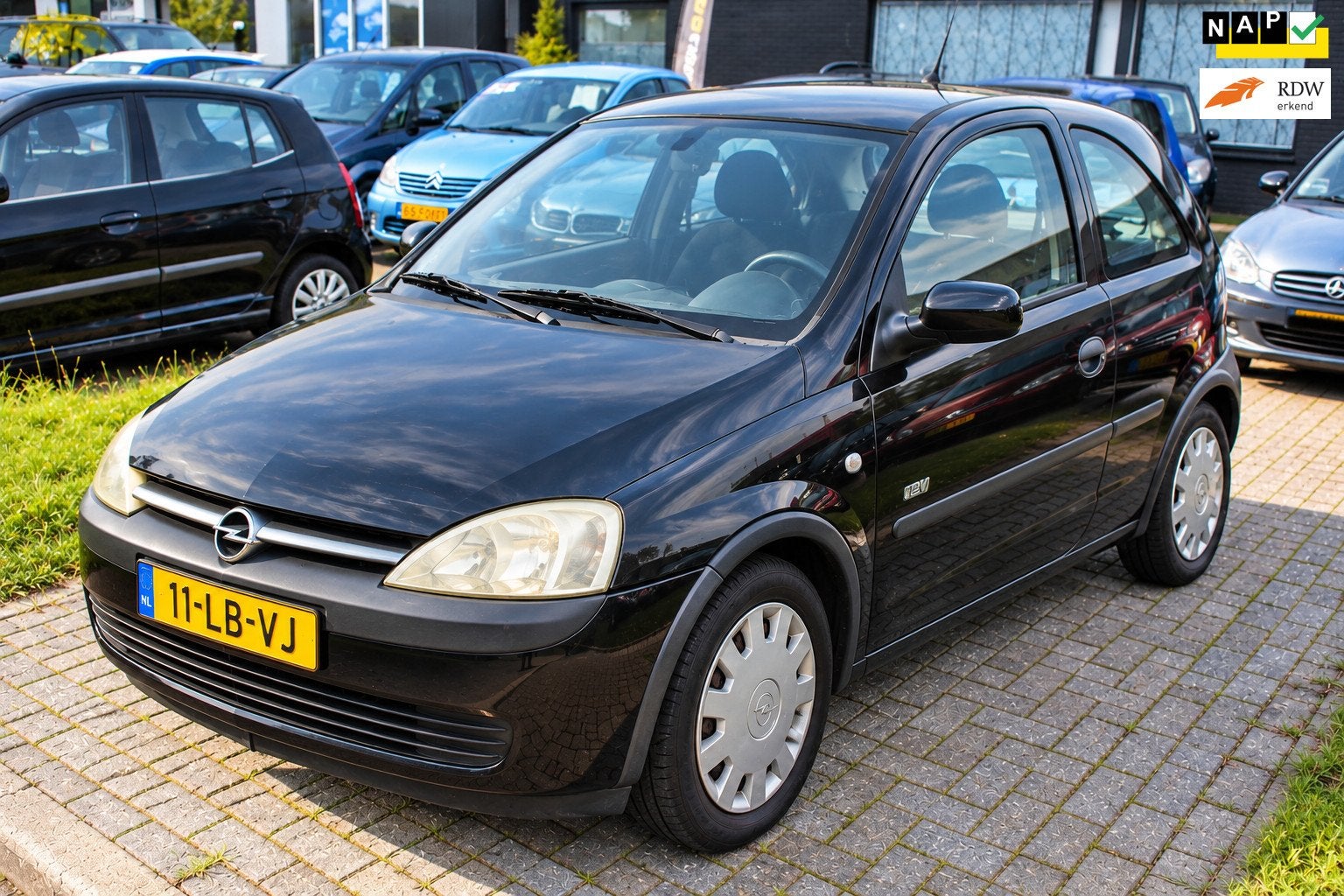 Opel Corsa 1.2-16V Njoy Trekhaak Elec ramen Centr deur vergr, Auto's, Voorwielaandrijving, Gebruikt, Zwart, Origineel Nederlands