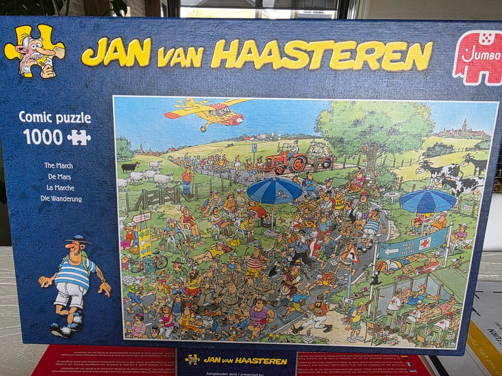 Zgan Jan van Haasteren puzzel: De Mars 1000sts, Ophalen of Verzenden, 500 t/m 1500 stukjes, Zo goed als nieuw, Legpuzzel