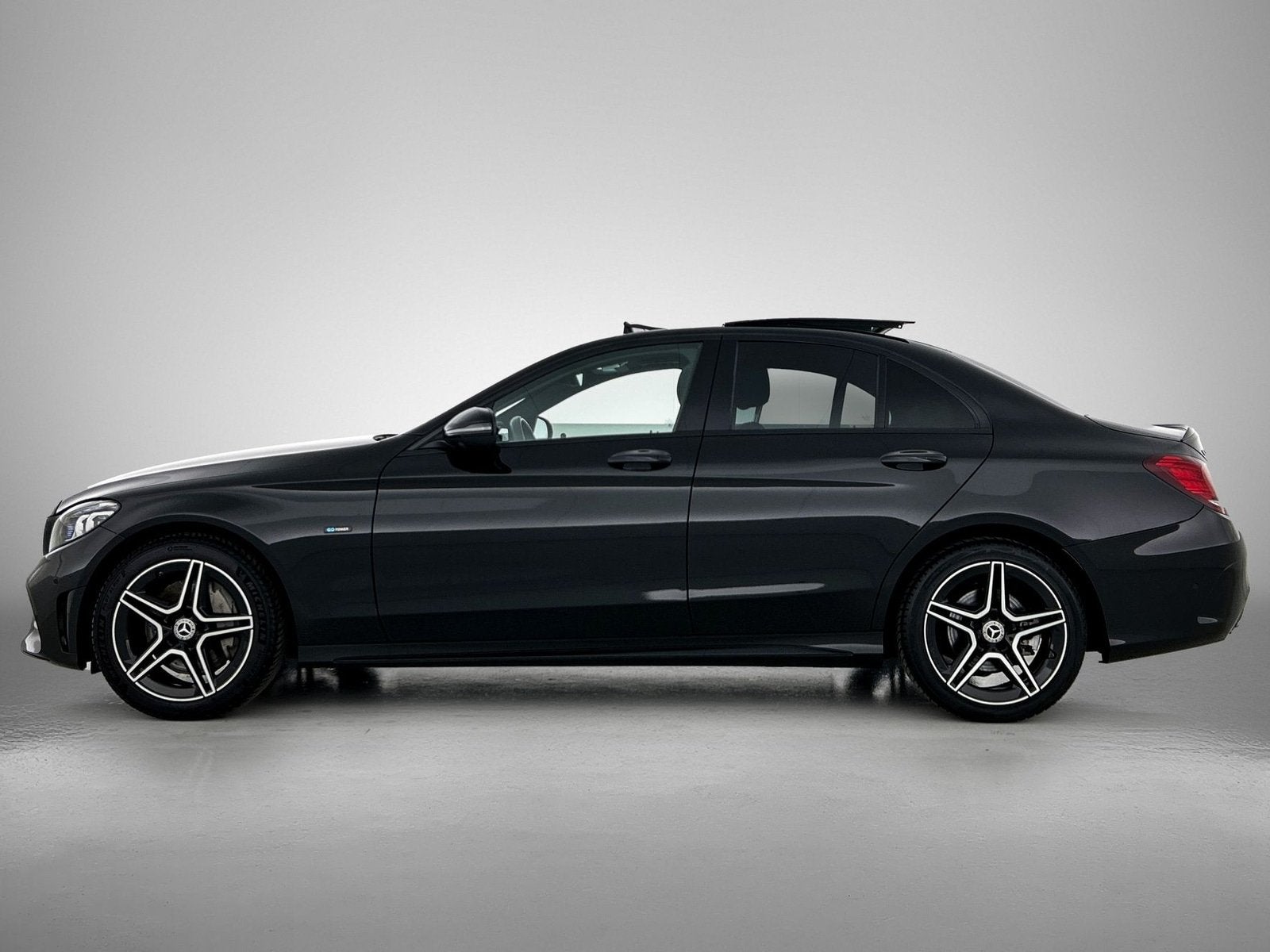 Mercedes-Benz C-Klasse 300 e Business Solution AMG Limited |, Auto's, Zwart, Bedrijf, Hybride Elektrisch/Benzine, Sedan