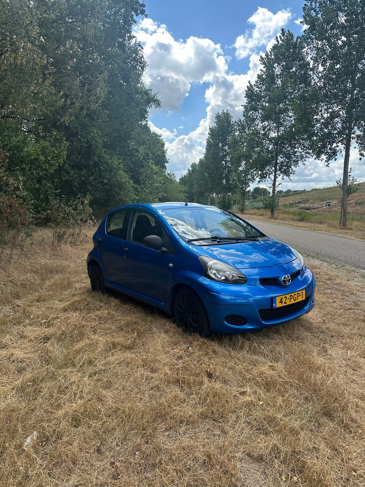 Toyota Aygo 1.0 2011 Blauw, Voorwielaandrijving, 68 pk, Origineel Nederlands, Handgeschakeld