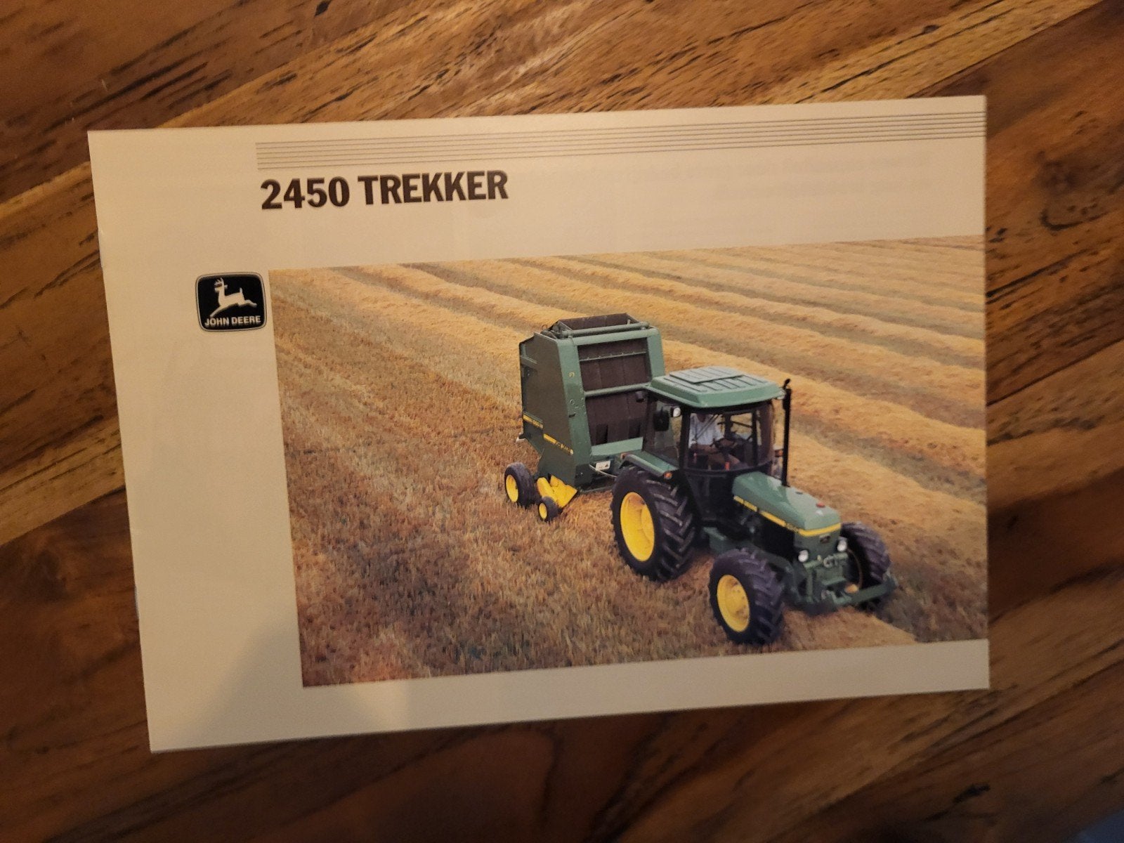 tractor folder John Deere 2450 trekker, Ophalen of Verzenden, Zo goed als nieuw