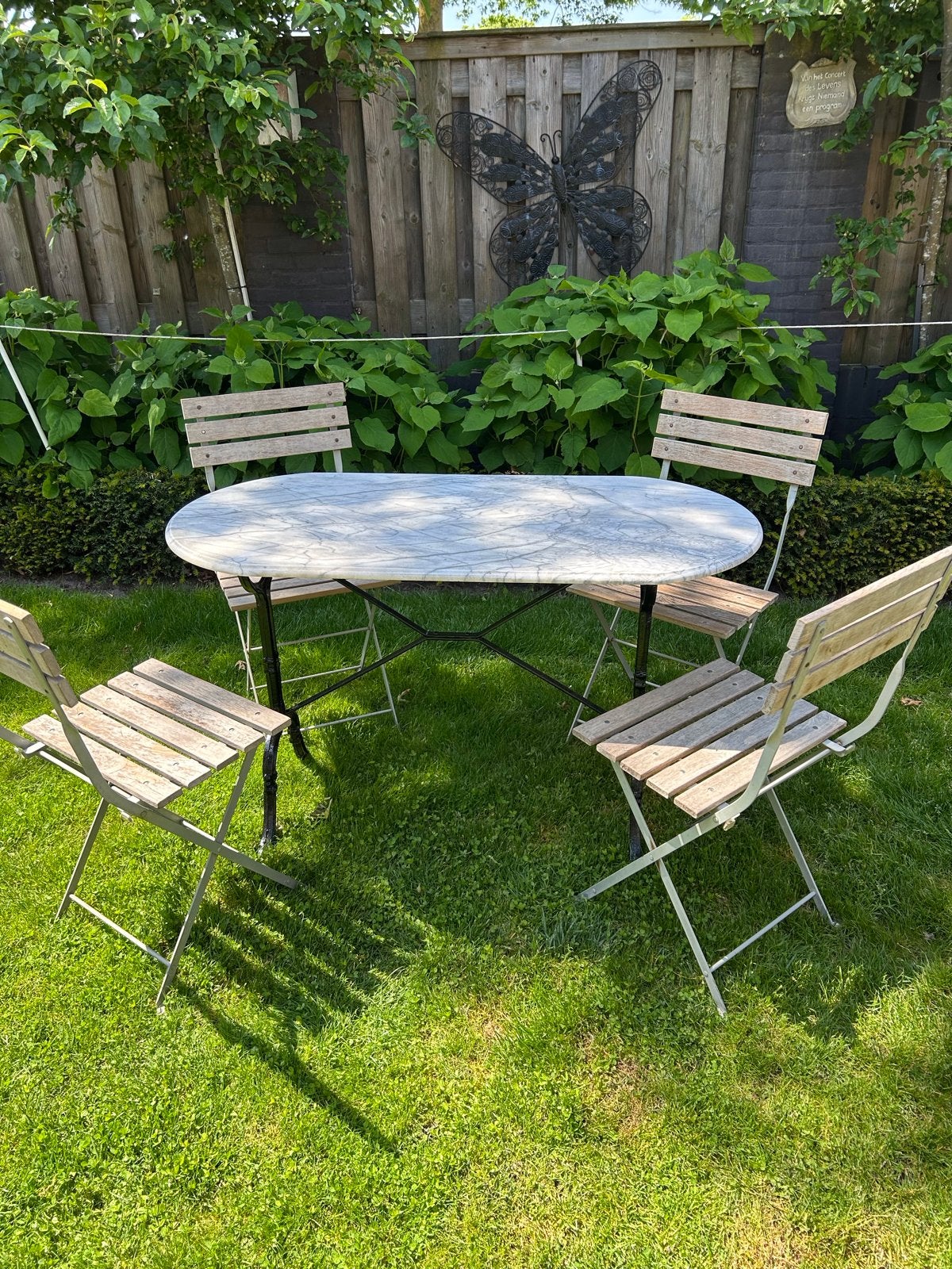 Ovale tuintafel met marmeren blad en 4 inklapbare stoelen, Tuin en Terras, Ophalen, 4 zitplaatsen, Gebruikt, Eettafel