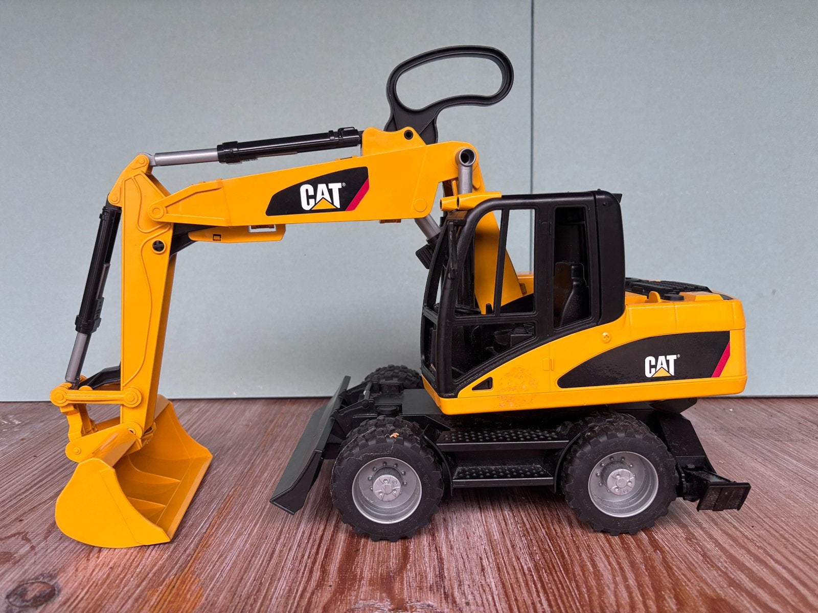 BRUDER CAT graafmachine op wielen, Kinderen en Baby's, Ophalen of Verzenden, Gebruikt