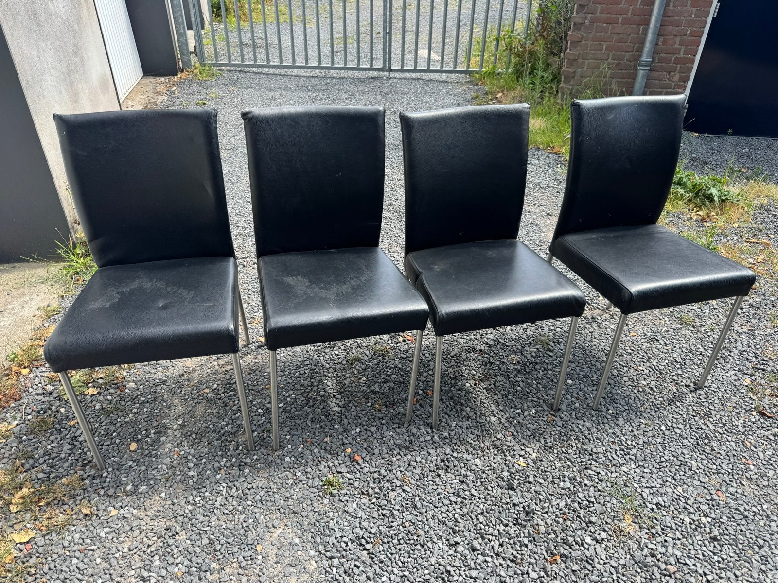 4 Zwarte Lederen Eetkamerstoelen met RVS Poten, Huis en Inrichting, Stoelen, Ophalen, Gebruikt, Zwart, Leer