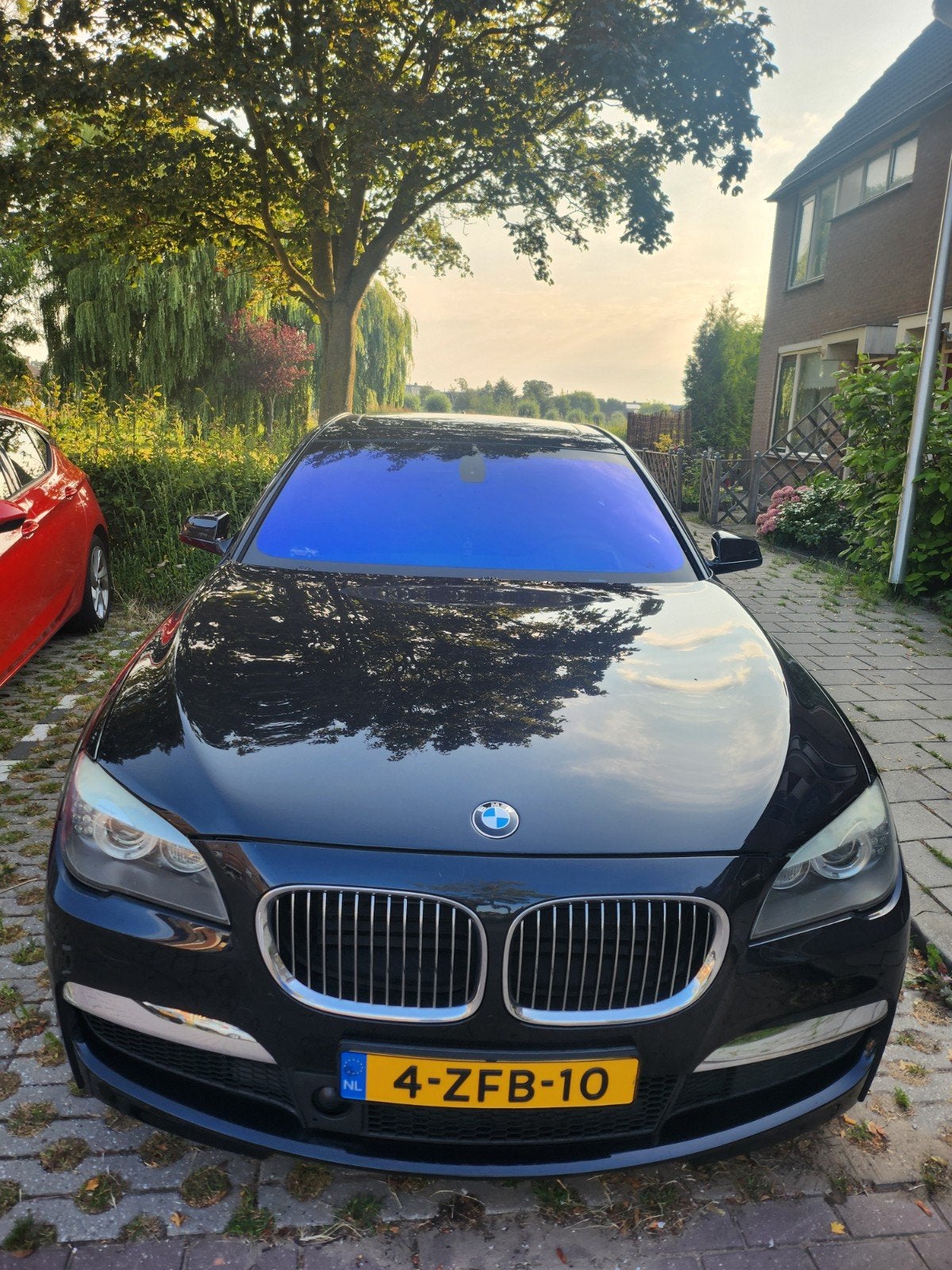 BMW 7-Serie 4.4 750I AUT 2010 M uitvoering. Donker blauw., Auto's, BMW, Automaat, 2005 kg, 4395 cc, Zwart