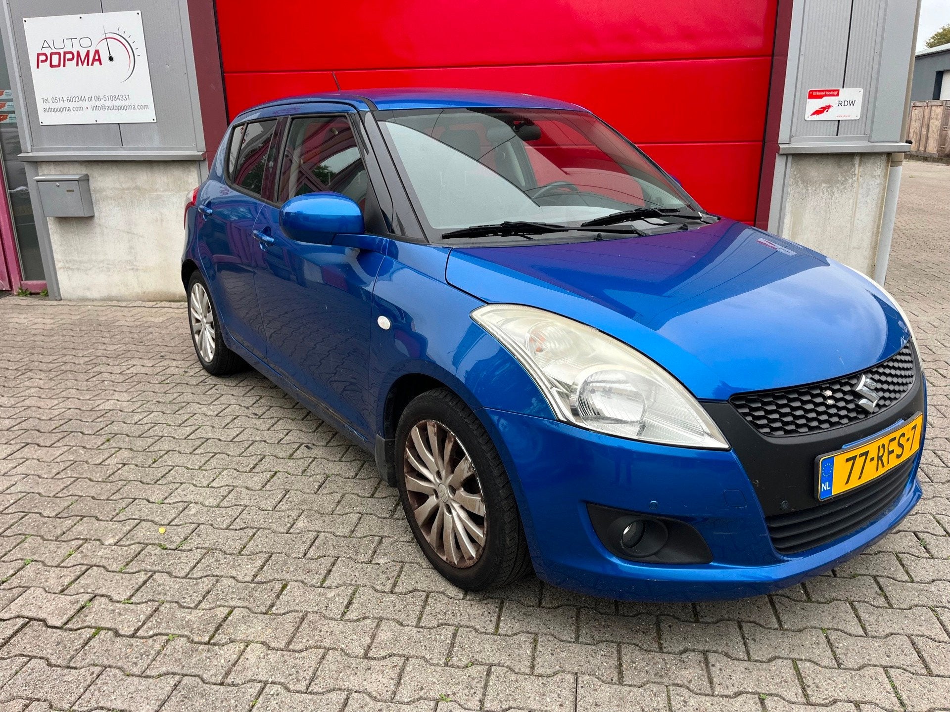 Suzuki Swift 1.2 94pk Exclusive Automaat / ALLEEN VOOR EXPOR, Auto's, Stof, 4 cilinders, 965 kg, Blauw