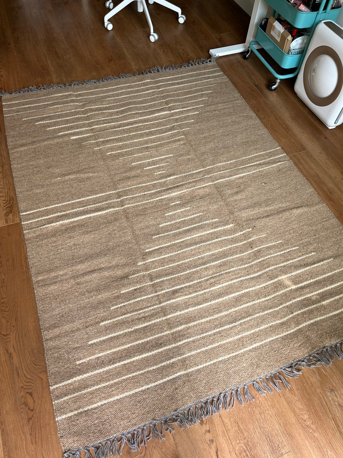 Ongebruikt 100% wollen machinewasbaar vloerkleed, Huis en Inrichting, Stoffering | Tapijten en Kleden, Ophalen, 100 tot 150 cm