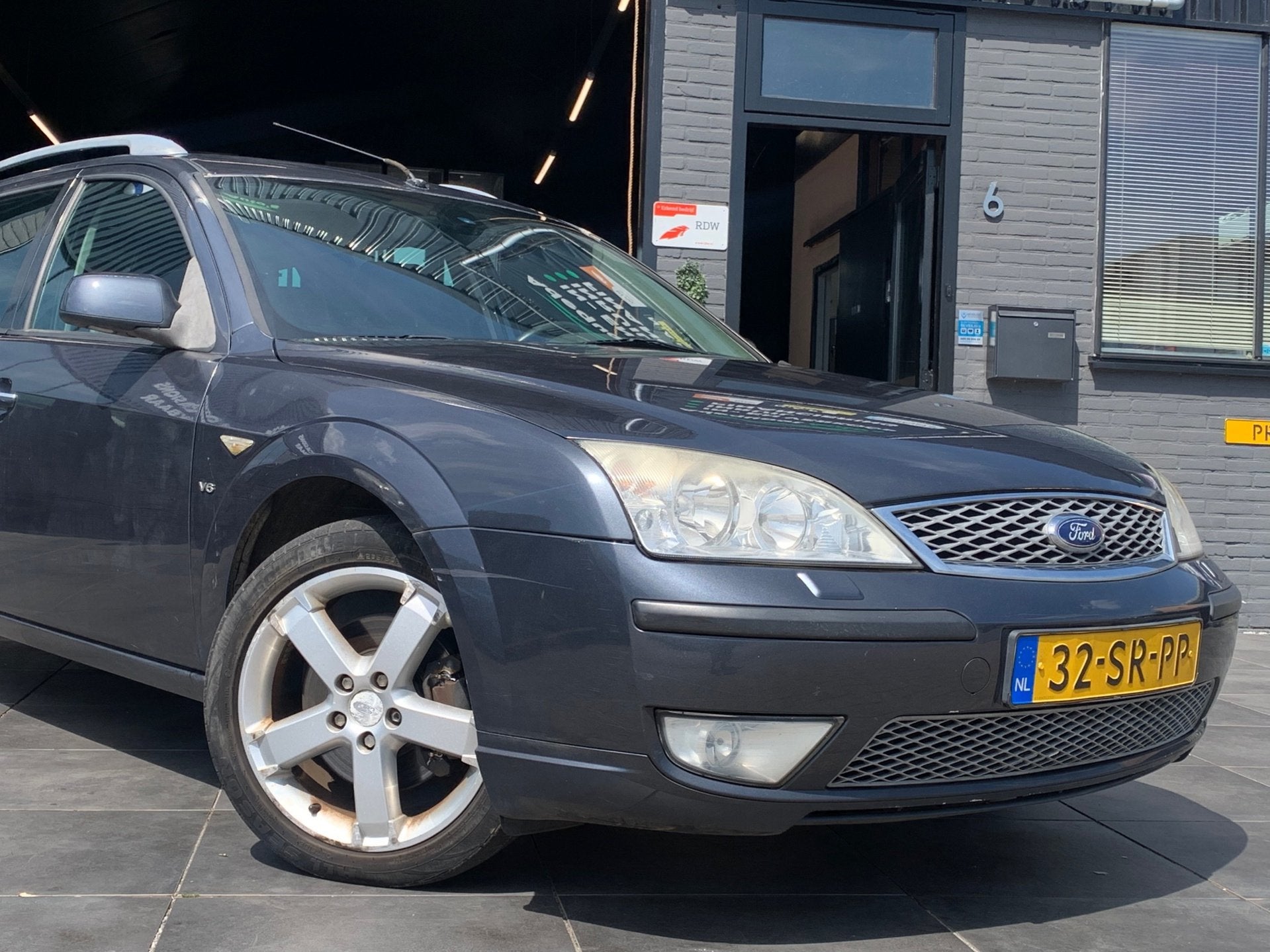 Ford Mondeo Wagon 2.5 V6 Platinum|Trekhaak|Stoelvw|Cruise, Auto's, Ford, Voorwielaandrijving, Zwart, Leder en Stof, 170 pk