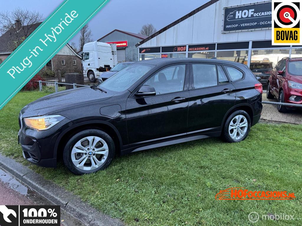 BMW X1 XDrive25e Business Edition Plus NAVI / TREKHAAK, Gebruikt, 750 kg, Met garantie (alle), Automatische klimaatregeling