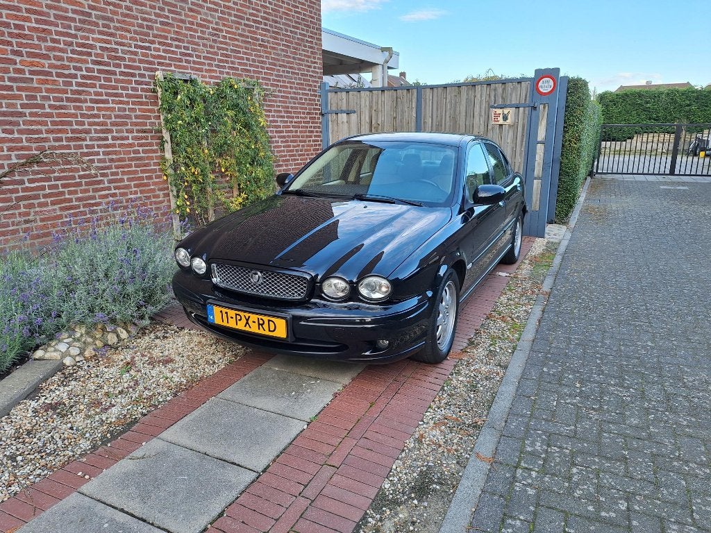 Jaguar X-Type 2.0 V6 2005 Zwart, Auto's, Voorwielaandrijving, 716 kg, Beige, 156 pk