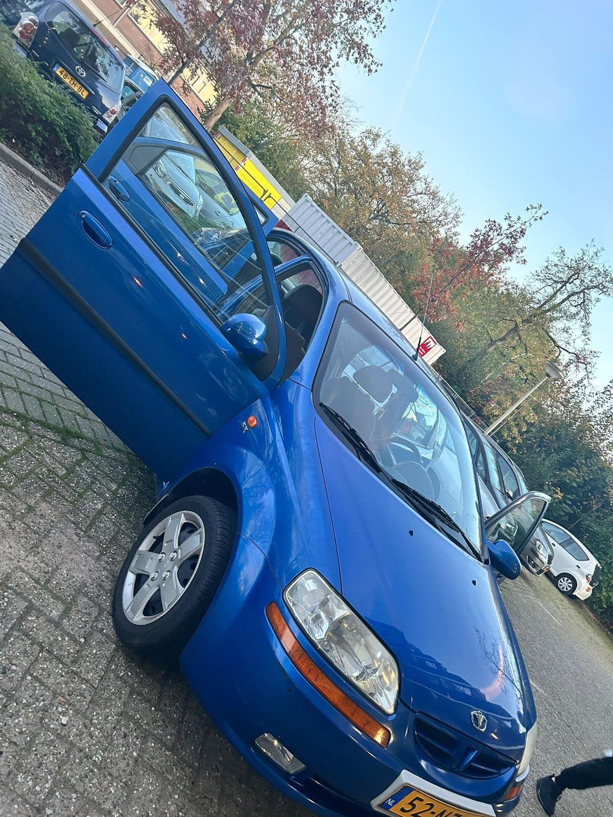 Daewoo Kalos 1.4 16V Sedan AUTOMAAT 2004 Blauw, Auto's, 40 €/maand, 4 cilinders, Origineel Nederlands, 93 pk