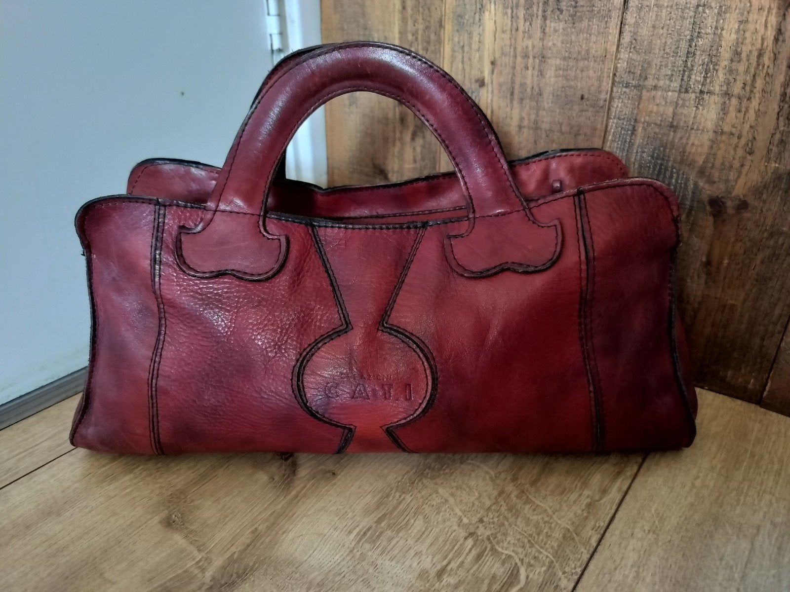 Prachtige vintage Italiaanse leren tas jaren 70 merk Cati

E, Verzenden