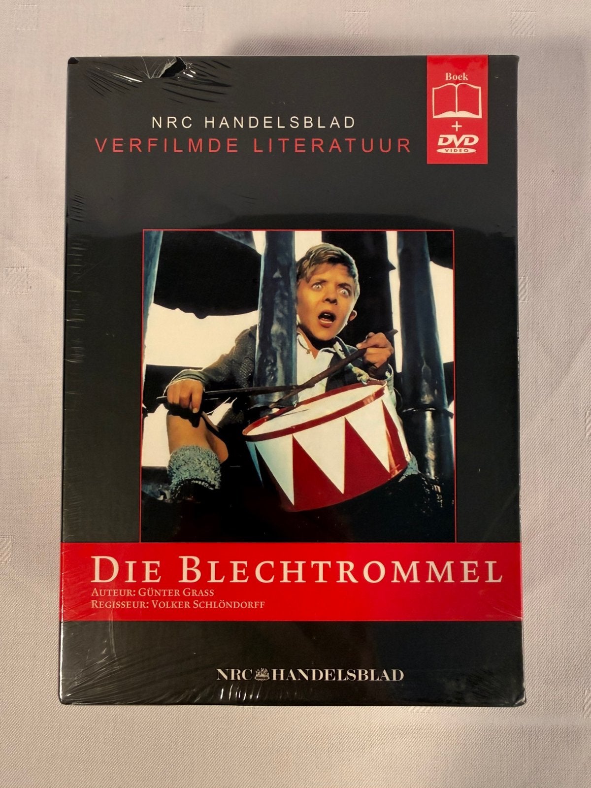 Die Blechtrommel / De Blikken Trommel – Boek + DVD, Overige gebieden, Ophalen of Verzenden, Nieuw in verpakking, Alle leeftijden
