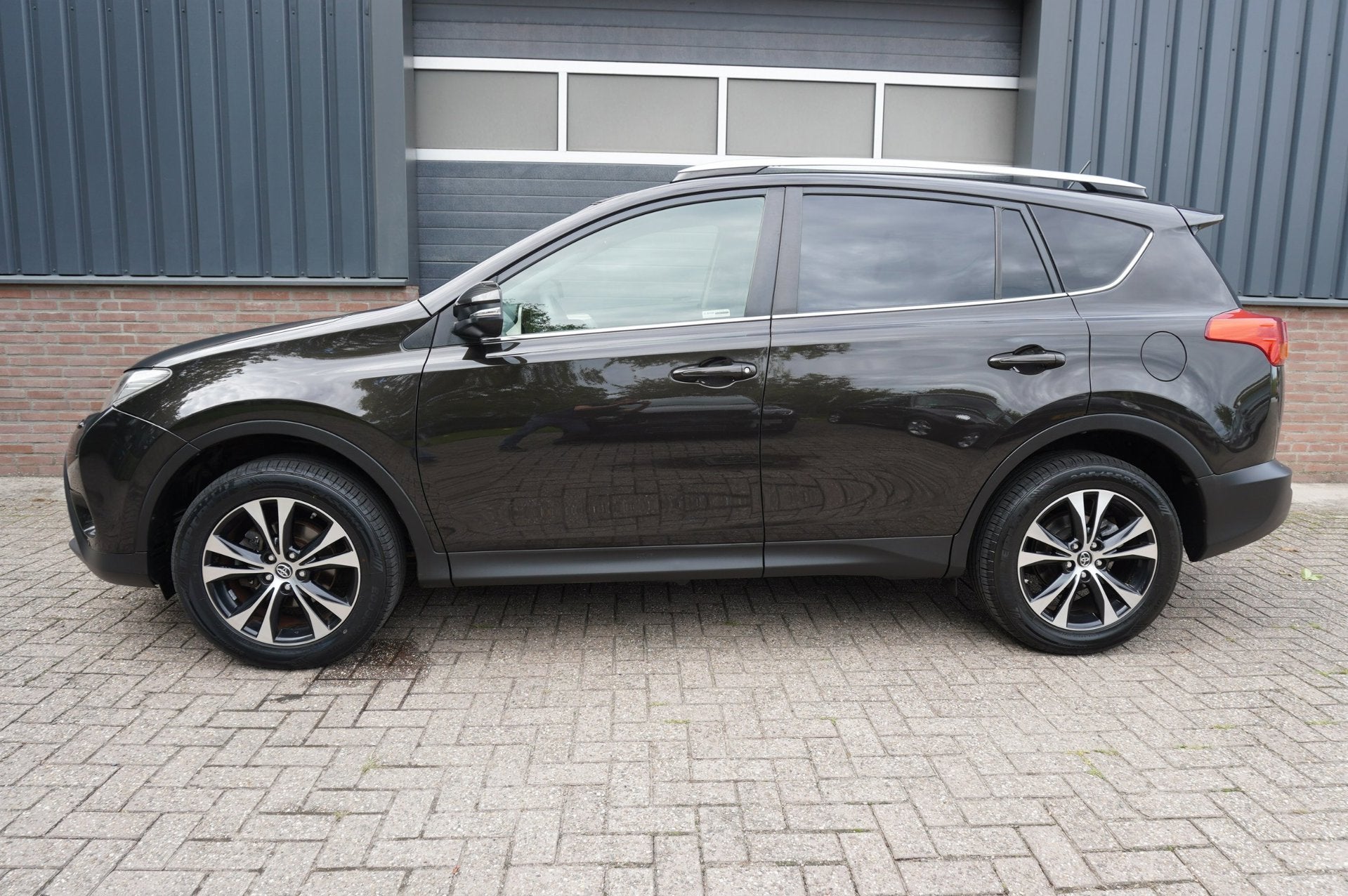 Toyota RAV4 2.0 Style 4WD Navi / Trekhaak / Achteruitrijcame, Euro 5, Stof, Gebruikt, Zwart