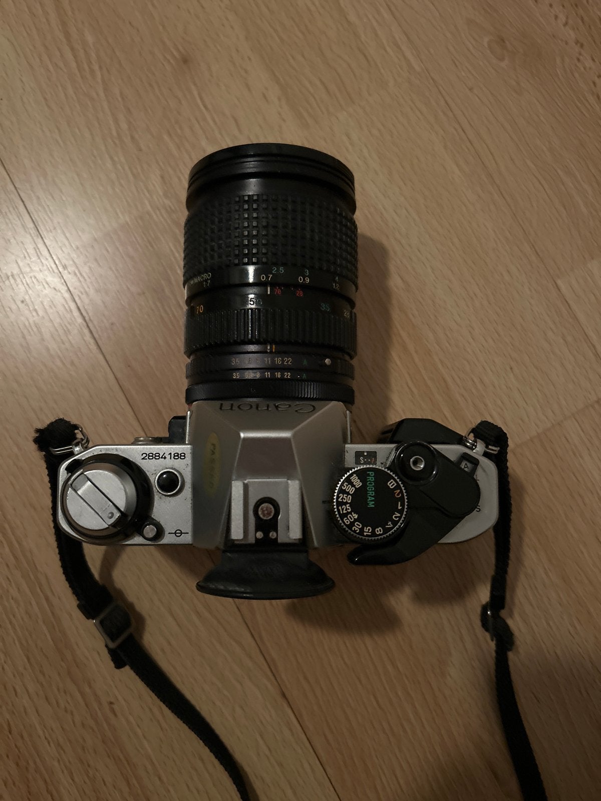 Canon AE-1 Program Spiegelreflexcamera met Tokina 28-70mm le, Audio, Tv en Foto, Ophalen of Verzenden, Gebruikt, Spiegelreflex