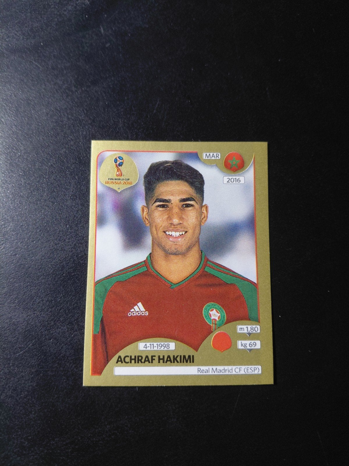 Achraf hakimi ROOKIE (gold edition) panini wk 2018, Verzenden, Nieuw, Buitenlandse clubs, Poster, Plaatje of Sticker