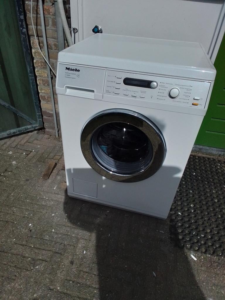 Miele wasmachine 7 kilo 1400 of 1600 toeren, Ophalen, 6 tot 8 kg, Gebruikt, 1600 toeren of meer