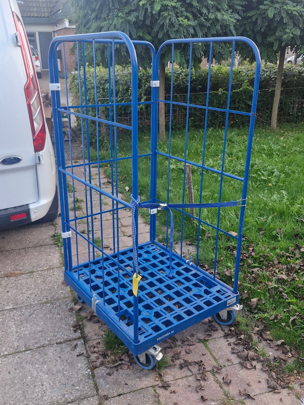 2x Blauwe Kruizinga Rolcontainer, Ophalen