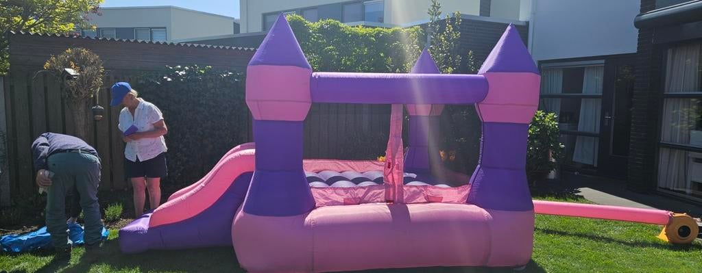 Luchtkussen te huur - Roze/Paars Kasteel met Glijbaan, Ophalen of Verzenden, Gebruikt
