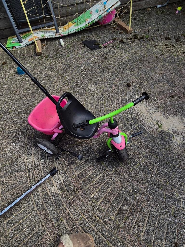 Roze Puky driewieler met duwstang, Ophalen