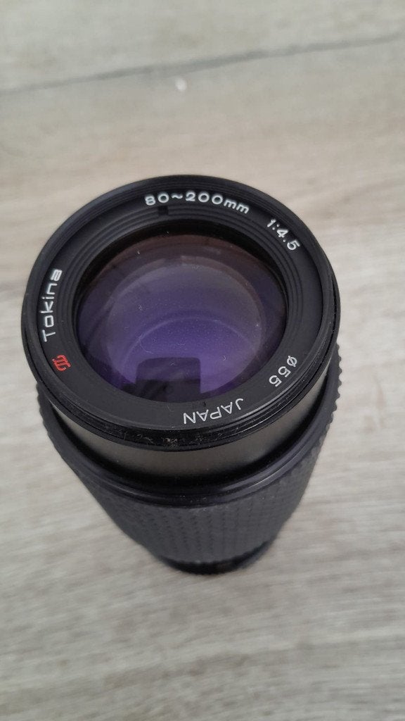 Tokina 80-200mm f/4.5 Zoomlens, Tokina, Handmatige focus, Zo goed als nieuw, Telelens