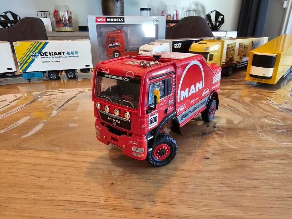 Man tga dakar hans stacey schaal 1:43, Hobby en Vrije tijd, Modelauto's | 1:43, Ophalen, Zo goed als nieuw, Bus of Vrachtwagen