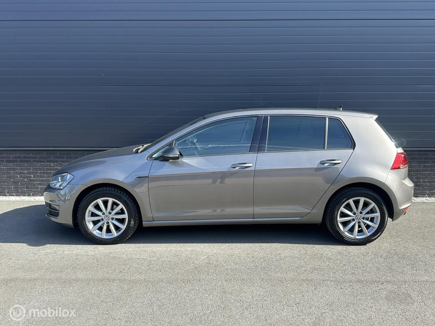 Volkswagen Golf 1.2 TSI DSG Lounge Edition CLIMA*CRUISE*PDC*, Gebruikt, Huisgarantie, 4 cilinders, Met garantie (alle)