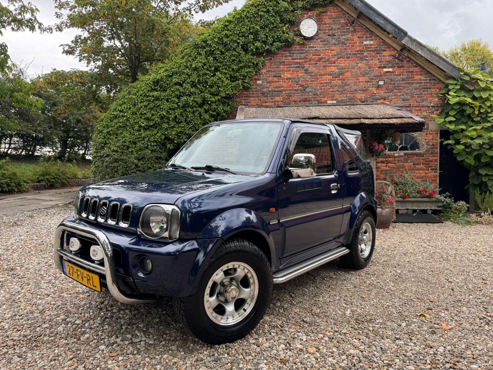 Suzuki Jimny 1.3 Cabrio 4WD Blauw, goed onderhouden, 1e eig!, Auto's, Stof, 40 €/maand, 4 cilinders, Handgeschakeld