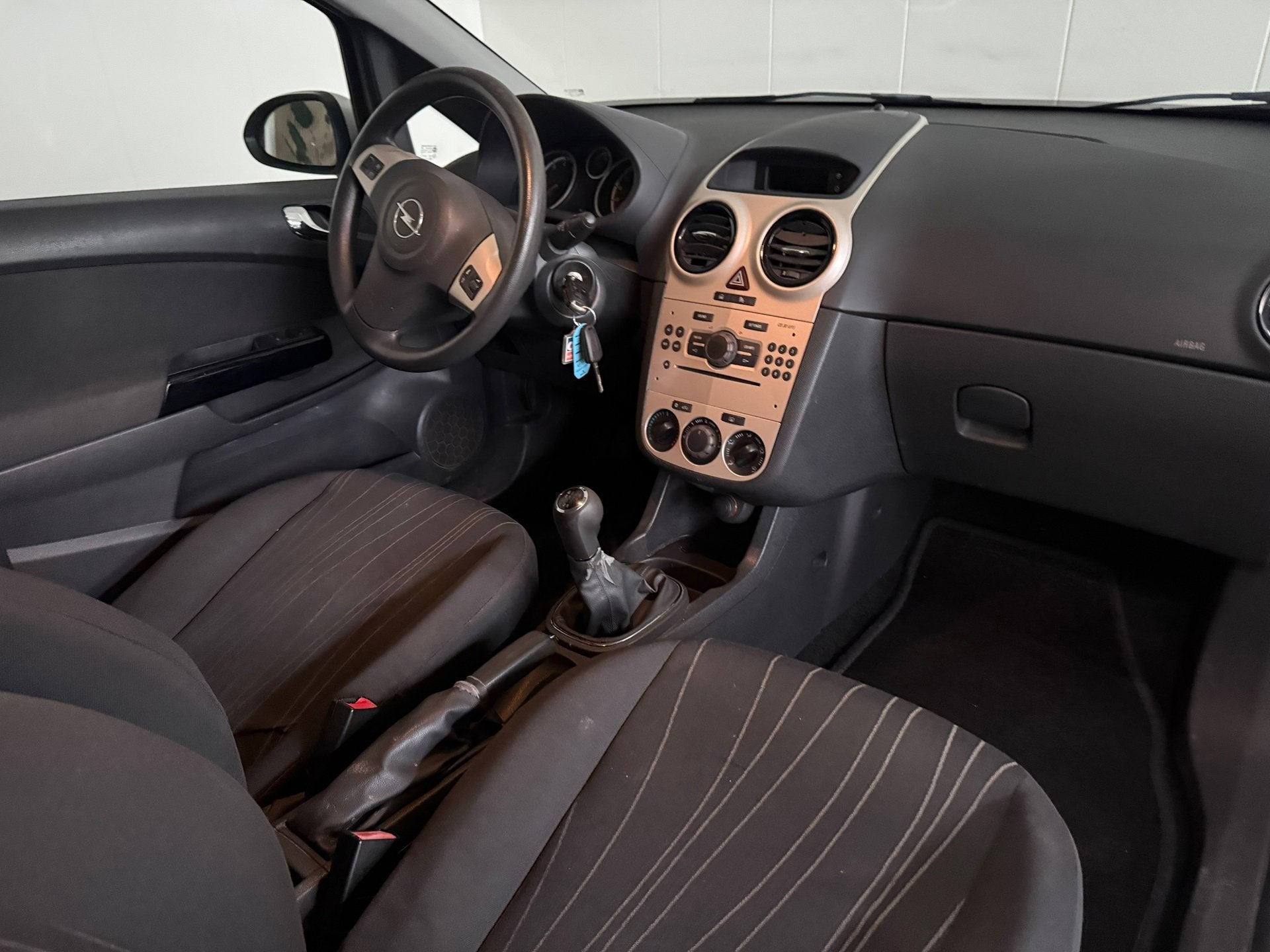 Opel Corsa 1.2-16V Business Airco, Trekhaak, Auto's, Voorwielaandrijving, 450 kg, 4 cilinders, 1229 cc