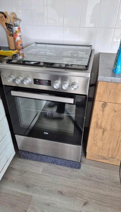 RVS fornuis met oven en wokbrander, Ophalen, 50 tot 100 cm, Minder dan 100 cm
