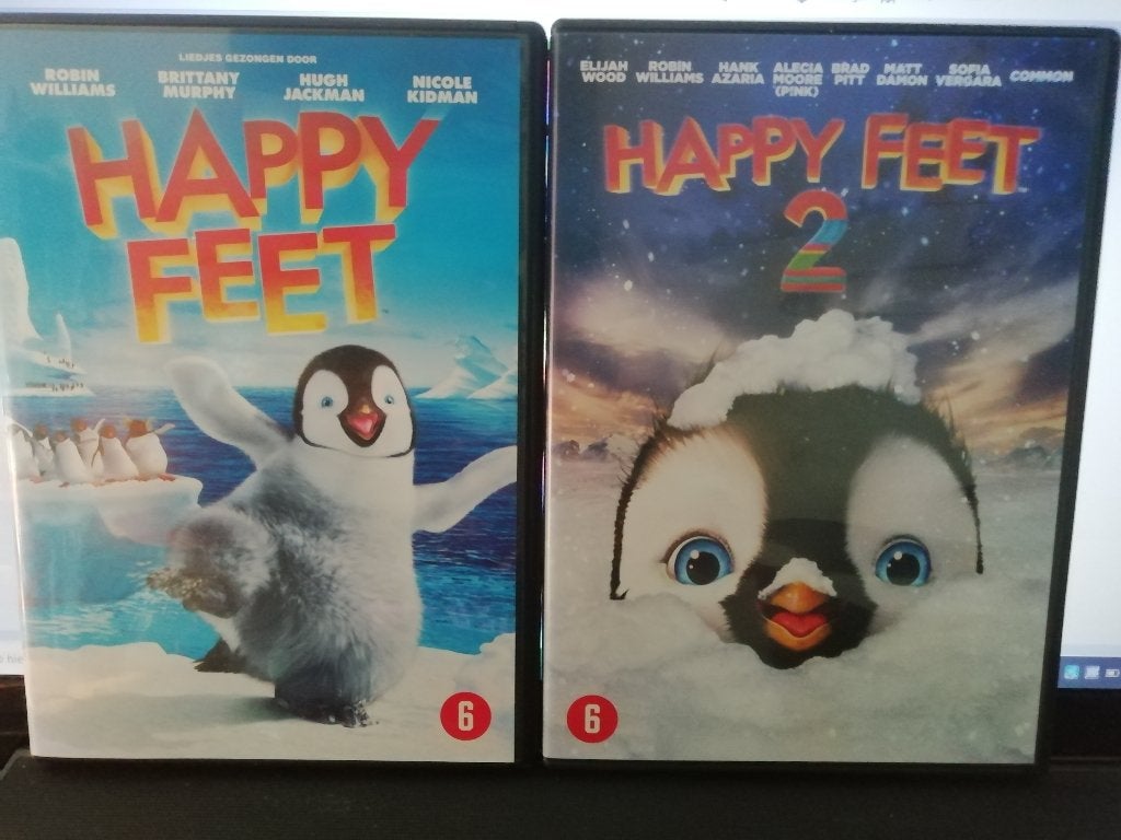 happy feet  ( set - delen 1 en 2 ), Alle leeftijden, Ophalen of Verzenden, Zo goed als nieuw, Overige soorten